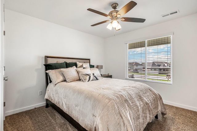 4786 E Whitman Rd, Springfield, MO 65802 - carpeted bedroom with baseboards and ceiling fan