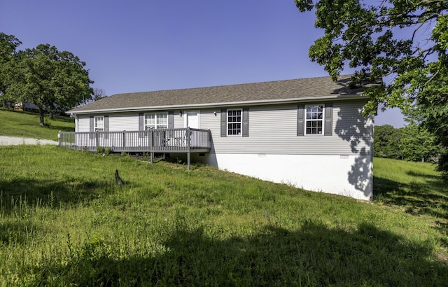 2800 State Highway Bb, Hollister, MO 65672 - back of property featuring crawl space, a deck, a lawn, and a shingled roof