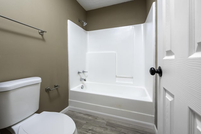 2800 State Highway Bb, Hollister, MO 65672 - bathroom with toilet, wood finished floors, baseboards, and  shower combination