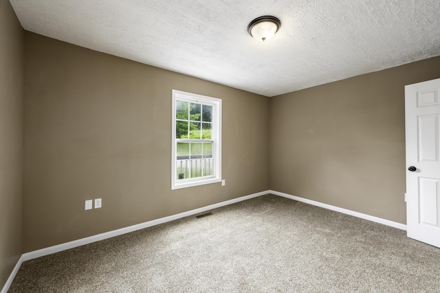 2800 State Highway Bb, Hollister, MO 65672 - spare room featuring carpet floors, baseboards, and a textured ceiling