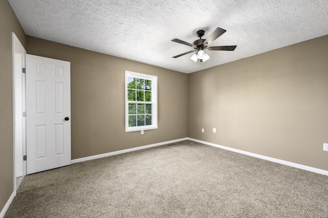 2800 State Highway Bb, Hollister, MO 65672 - spare room with ceiling fan, carpet floors, baseboards, and a textured ceiling
