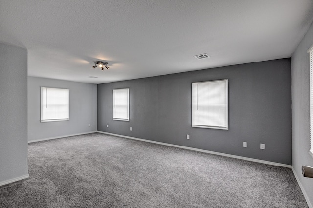511 N E, Columbus, KS 66725 - carpeted spare room with baseboards