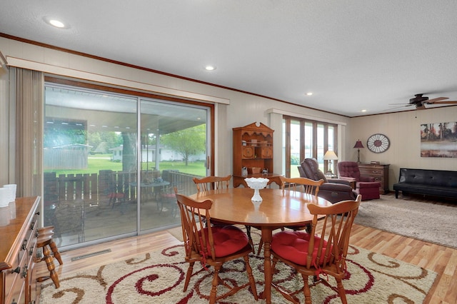 940 Carl Allen St, Mount Vernon, MO 65712 - dining space featuring ornamental molding, ceiling fan, wood finished floors, a textured ceiling, and recessed lighting