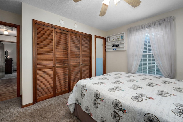 940 Carl Allen St, Mount Vernon, MO 65712 - carpeted bedroom with a closet and ceiling fan