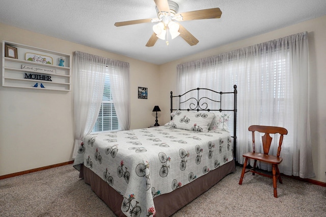 940 Carl Allen St, Mount Vernon, MO 65712 - carpeted bedroom featuring baseboards, a ceiling fan, and a textured ceiling