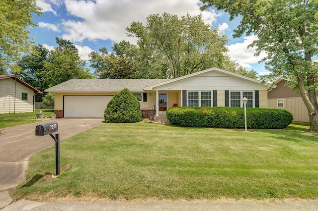 940 Carl Allen St, Mount Vernon, MO 65712 - single story home featuring concrete driveway, an attached garage, a front yard, and brick siding