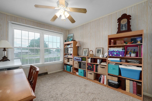 940 Carl Allen St, Mount Vernon, MO 65712 - carpeted office space featuring a ceiling fan, baseboards, ornamental molding, and wooden walls