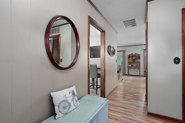 940 Carl Allen St, Mount Vernon, MO 65712 - hall featuring light wood-style flooring and a textured ceiling