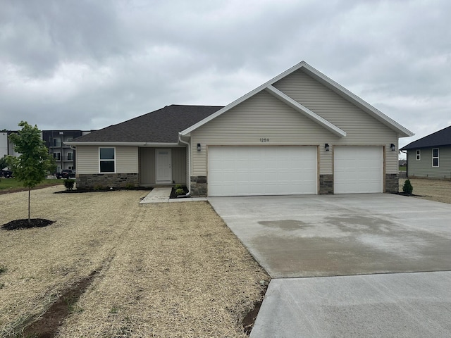 1271 N Maxine Ave, Nixa, MO 65714 - single story home featuring a garage, stone siding, concrete driveway, and a shingled roof