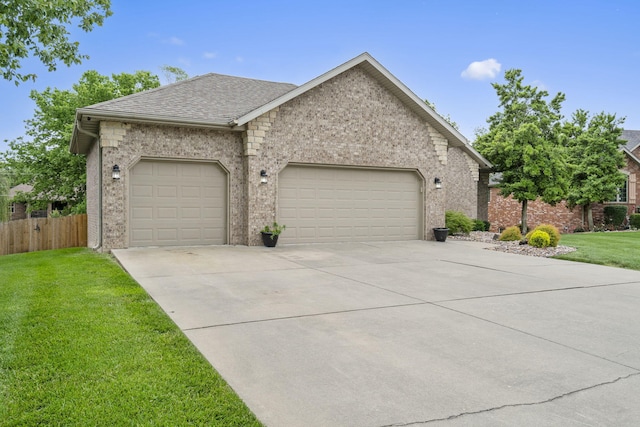 604 N Cascades Dr, Nixa, MO 65714 - view of front of property featuring an attached garage, concrete driveway, brick siding, and a shingled roof
