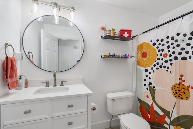 604 N Cascades Dr, Nixa, MO 65714 - bathroom featuring vanity, toilet, baseboards, and curtained shower
