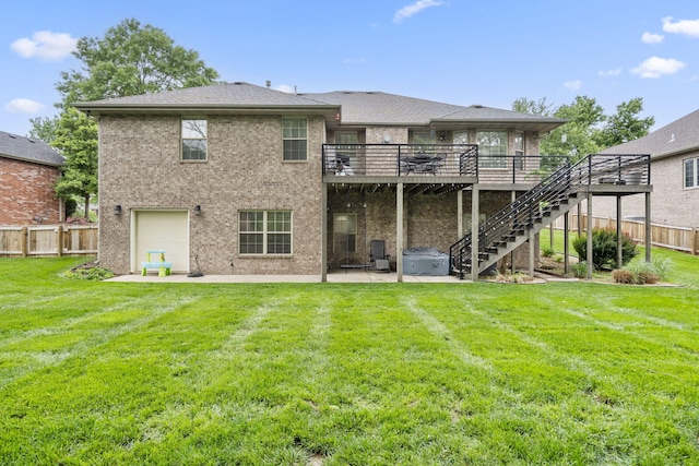 604 N Cascades Dr, Nixa, MO 65714 - back of house featuring a patio, a deck, stairs, a garage, and brick siding
