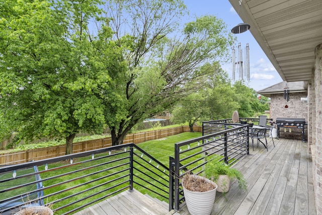 604 N Cascades Dr, Nixa, MO 65714 - deck featuring a grill and outdoor dining space