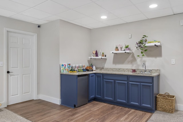604 N Cascades Dr, Nixa, MO 65714 - bar with a sink, wood finished floors, baseboards, a drop ceiling, and refrigerator