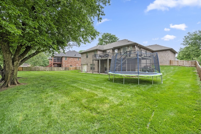 604 N Cascades Dr, Nixa, MO 65714 - view of yard with a trampoline