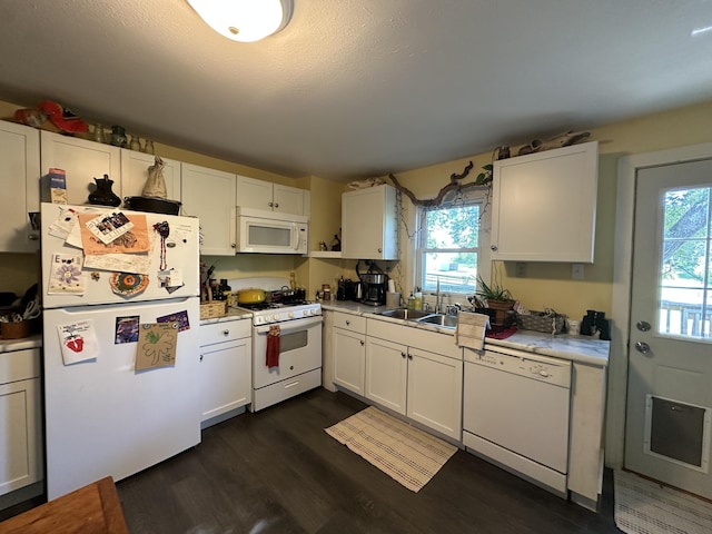9611 Co Rd Unit A-436, Ava, MO 65608 - kitchen with white appliances, dark wood-type flooring, light countertops, and white cabinetry