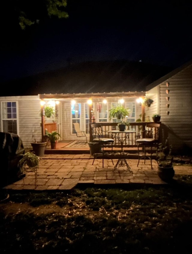 3943 W Kay Pointe Blvd, Springfield, MO 65802 - patio at twilight featuring a patio