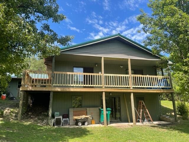 10694 Red Spring Rd, Mountain Grove, MO 65711 - rear view of house with a lawn and a deck