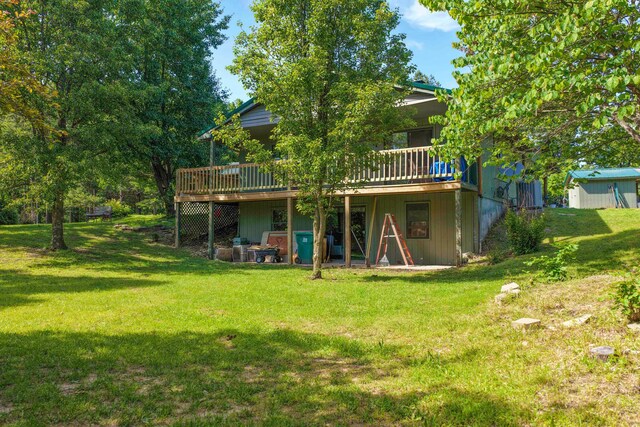 10694 Red Spring Rd, Mountain Grove, MO 65711 - back of property with a deck and a yard