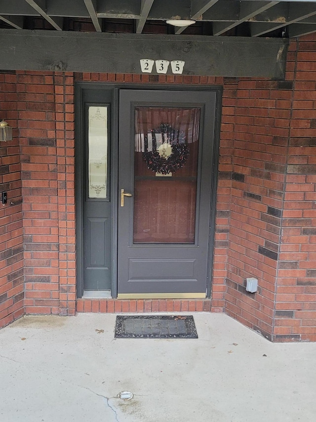 150 Sunken Forest Dr Unit 235, Forsyth, MO 65653 - view of exterior entry featuring brick siding
