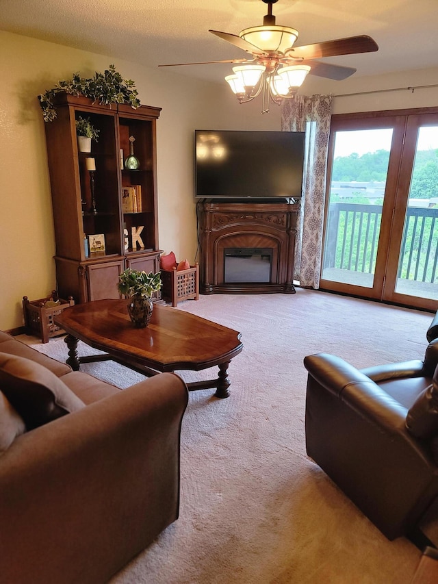 150 Sunken Forest Dr Unit 235, Forsyth, MO 65653 - living area with carpet floors, ceiling fan, and a fireplace
