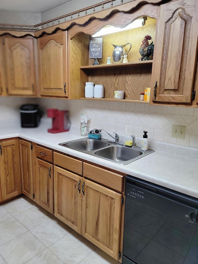 150 Sunken Forest Dr Unit 235, Forsyth, MO 65653 - kitchen featuring black dishwasher, open shelves, light countertops, backsplash, and a sink