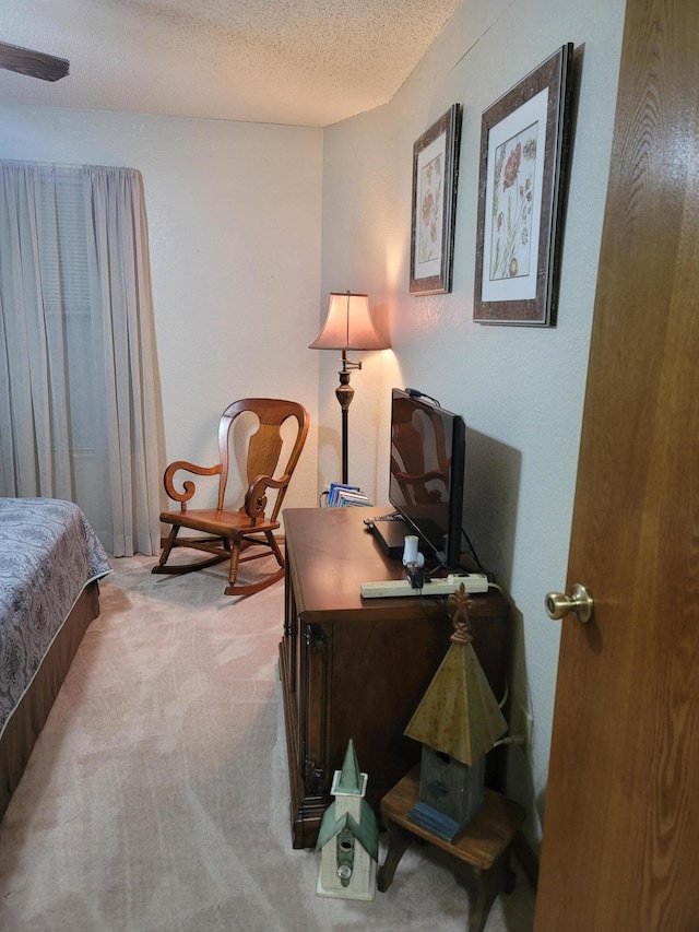 150 Sunken Forest Dr Unit 235, Forsyth, MO 65653 - bedroom featuring carpet flooring, an office area, and a textured ceiling
