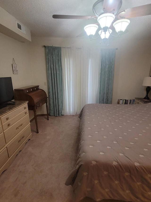 150 Sunken Forest Dr Unit 235, Forsyth, MO 65653 - carpeted bedroom with a ceiling fan and a textured ceiling