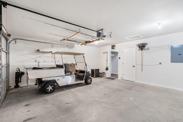 131 Lake Beach Ln, Hollister, MO 65672 - garage with electric panel and a garage door opener