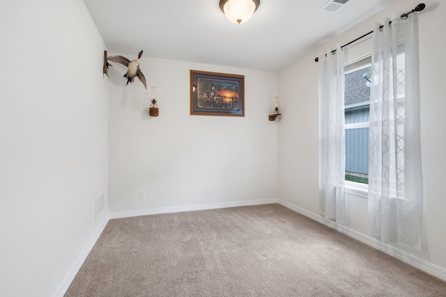 131 Lake Beach Ln, Hollister, MO 65672 - spare room with carpet flooring and baseboards