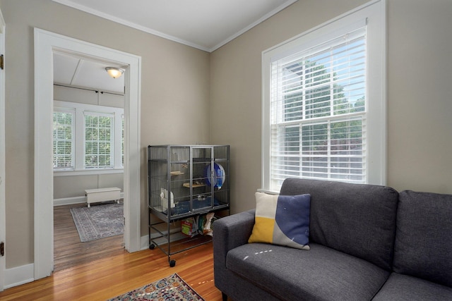 1501 E Walnut St, Springfield, MO 65802 - sitting room featuring ornamental molding, light wood-type flooring, and baseboards