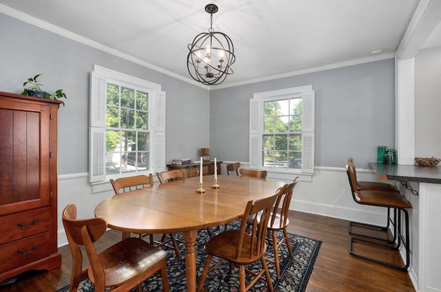 1501 E Walnut St, Springfield, MO 65802 - dining space featuring plenty of natural light, baseboards, ornamental molding, dark wood-style flooring, and a chandelier