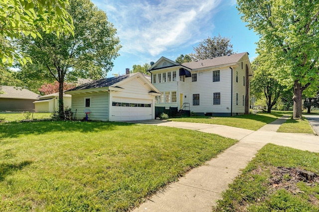 1501 E Walnut St, Springfield, MO 65802 - view of front of house with a front lawn and driveway