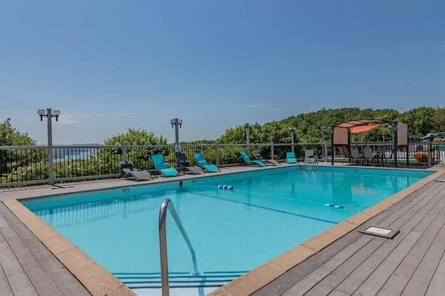 10 Treehouse Ln Unit 11, Branson, MO 65616 - community pool with a wooden deck