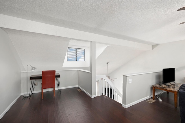 10 Treehouse Ln Unit 11, Branson, MO 65616 - unfurnished office featuring ceiling fan, wood finished floors, baseboards, a textured ceiling, and lofted ceiling
