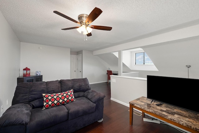 10 Treehouse Ln Unit 11, Branson, MO 65616 - living room featuring dark wood-type flooring, ceiling fan, a textured ceiling, and baseboards