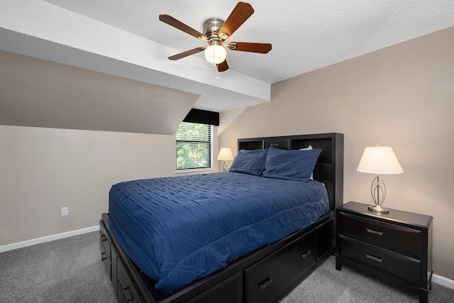 10 Treehouse Ln Unit 11, Branson, MO 65616 - carpeted bedroom featuring baseboards, ceiling fan, vaulted ceiling, and a textured ceiling