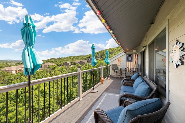 10 Treehouse Ln Unit 11, Branson, MO 65616 - balcony with outdoor dining area