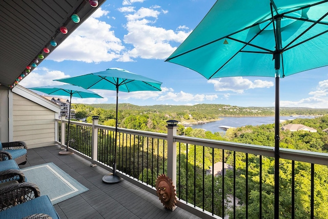 10 Treehouse Ln Unit 11, Branson, MO 65616 - wooden terrace with a water view