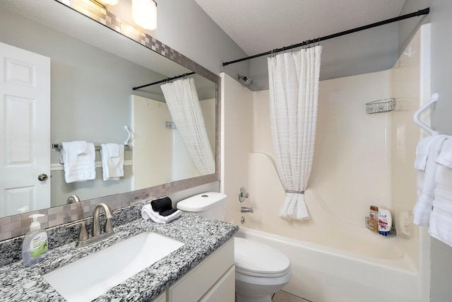 10 Treehouse Ln Unit 11, Branson, MO 65616 - full bath with shower / bath combo with shower curtain, toilet, vanity, and a textured ceiling