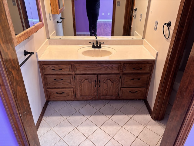 bathroom with vanity and tile patterned flooring
