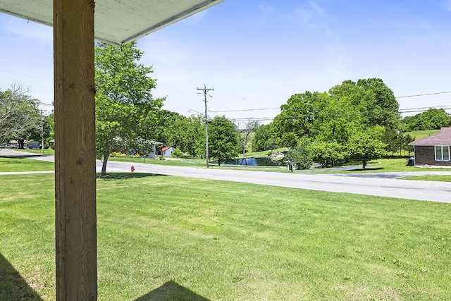 103 W Mockingbird Ln, Crane, MO 65633 - view of grassy yard with a water view