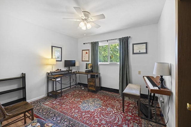 103 W Mockingbird Ln, Crane, MO 65633 - home office featuring ceiling fan and baseboards