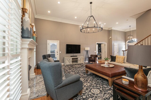 2539 S Forrest Heights Ave, Springfield, MO 65809 - living room with a chandelier, recessed lighting, stairway, and ornamental molding