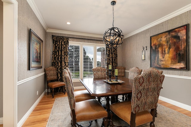 2539 S Forrest Heights Ave, Springfield, MO 65809 - dining area featuring light wood-style flooring, a chandelier, crown molding, baseboards, and wallpapered walls