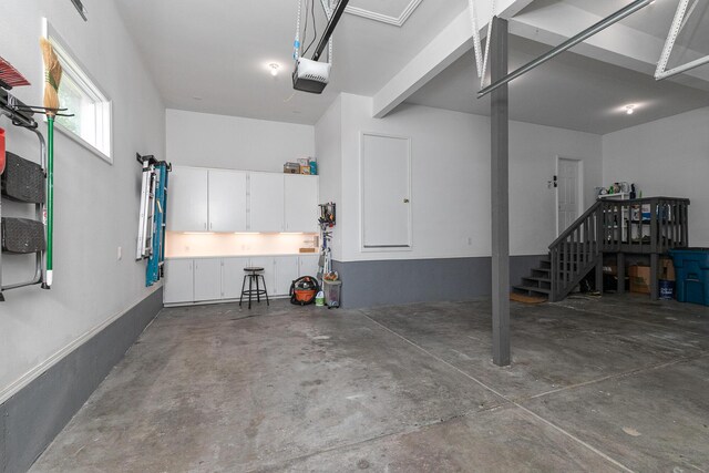 2539 S Forrest Heights Ave, Springfield, MO 65809 - garage featuring a garage door opener