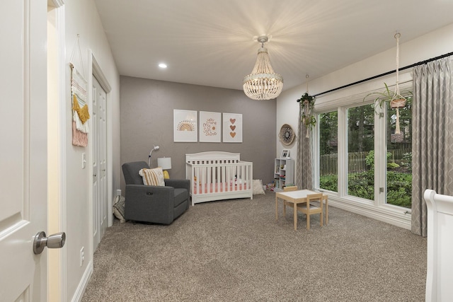 2539 S Forrest Heights Ave, Springfield, MO 65809 - carpeted bedroom featuring a chandelier, recessed lighting, and a nursery area