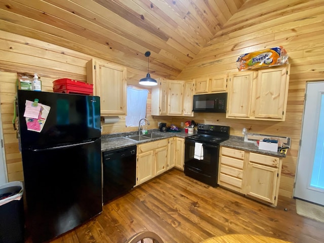 213 Spring Lake Dr, Mammoth Spring, AR 72554 - kitchen with black appliances, a sink, dark countertops, wood walls, and light brown cabinets