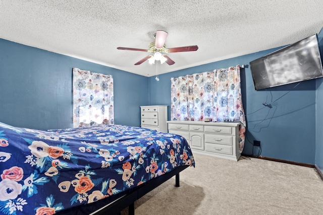 5680 N Farm Rd Unit 215, Strafford, MO 65757 - carpeted bedroom featuring ceiling fan, a textured ceiling, and baseboards