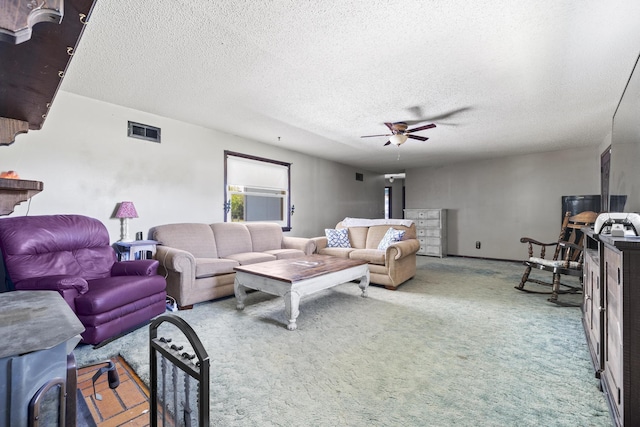 5680 N Farm Rd Unit 215, Strafford, MO 65757 - carpeted living room with ceiling fan and a textured ceiling